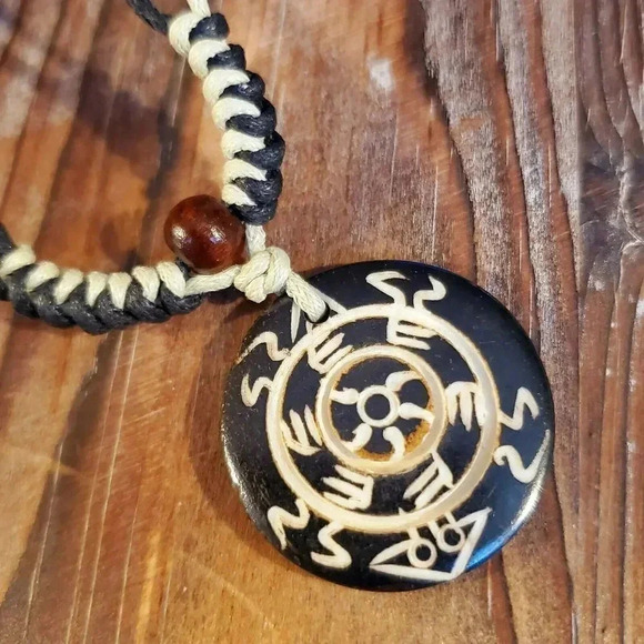 Handcrafted Tribal Buffalo Bone Carved Symbols Necklace from India - Picture 1 of 5